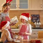 A mom and her kids making holiday cookies in one of the rentals in Big Sky.